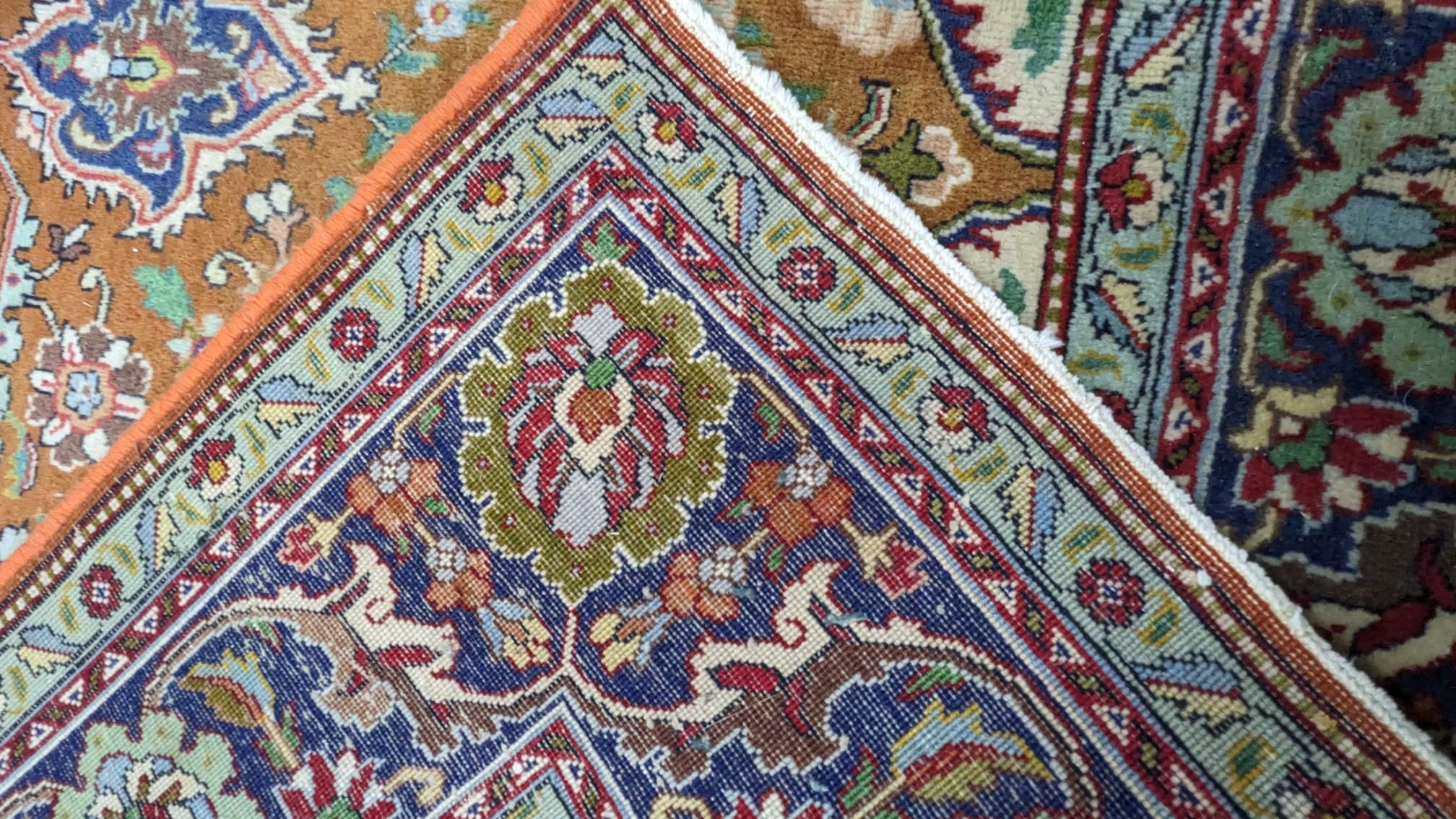 A Tabriz ivory ground carpet 360cm x 220cm